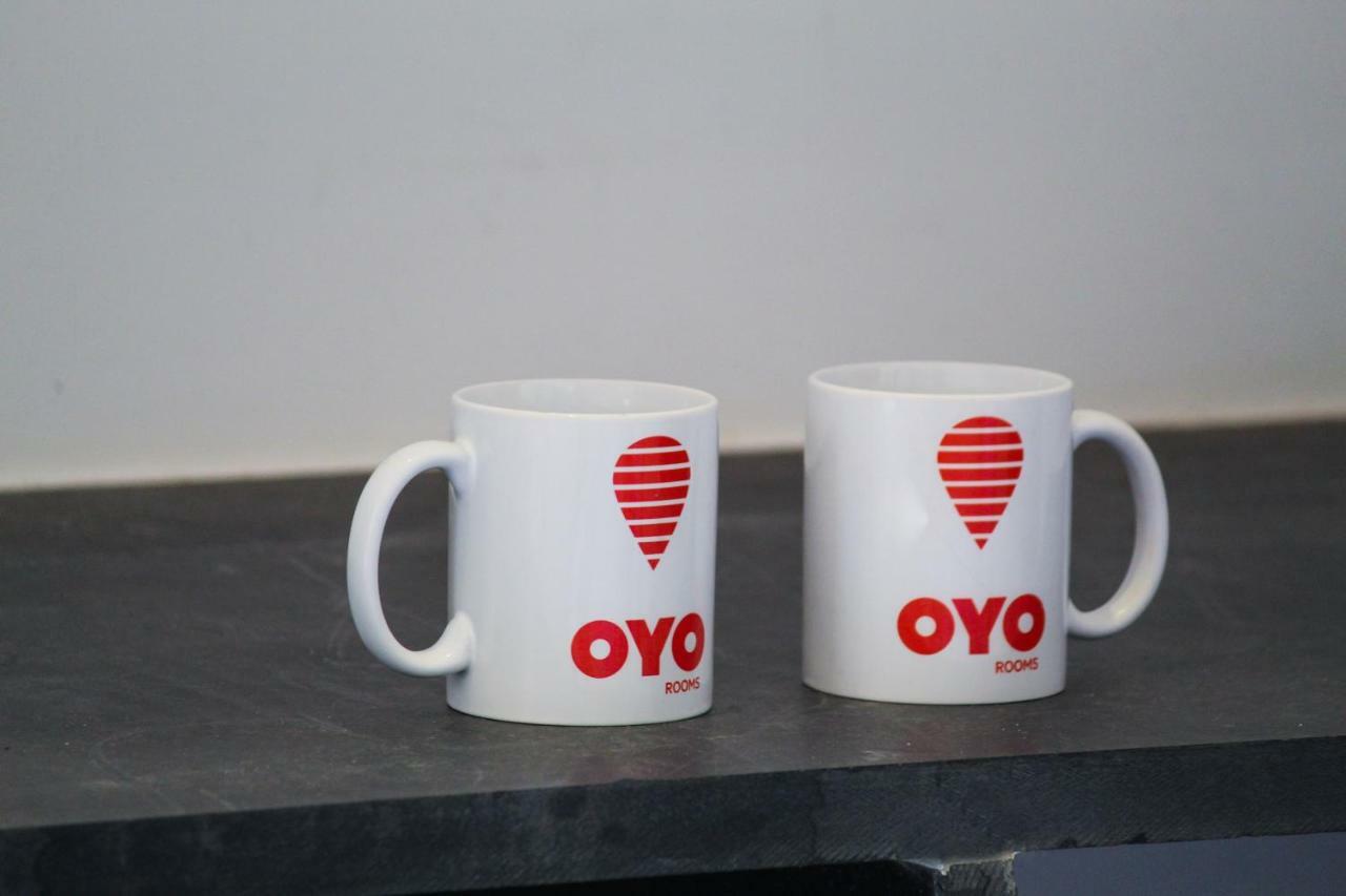 Oyo 13170 Victory Suites Bangalore Esterno foto